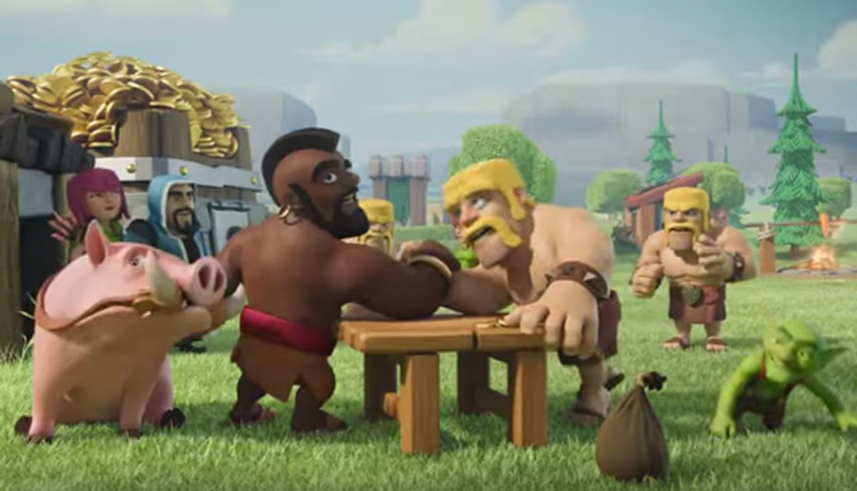 Two cartoon characters from Clash of Clans arm wrestling